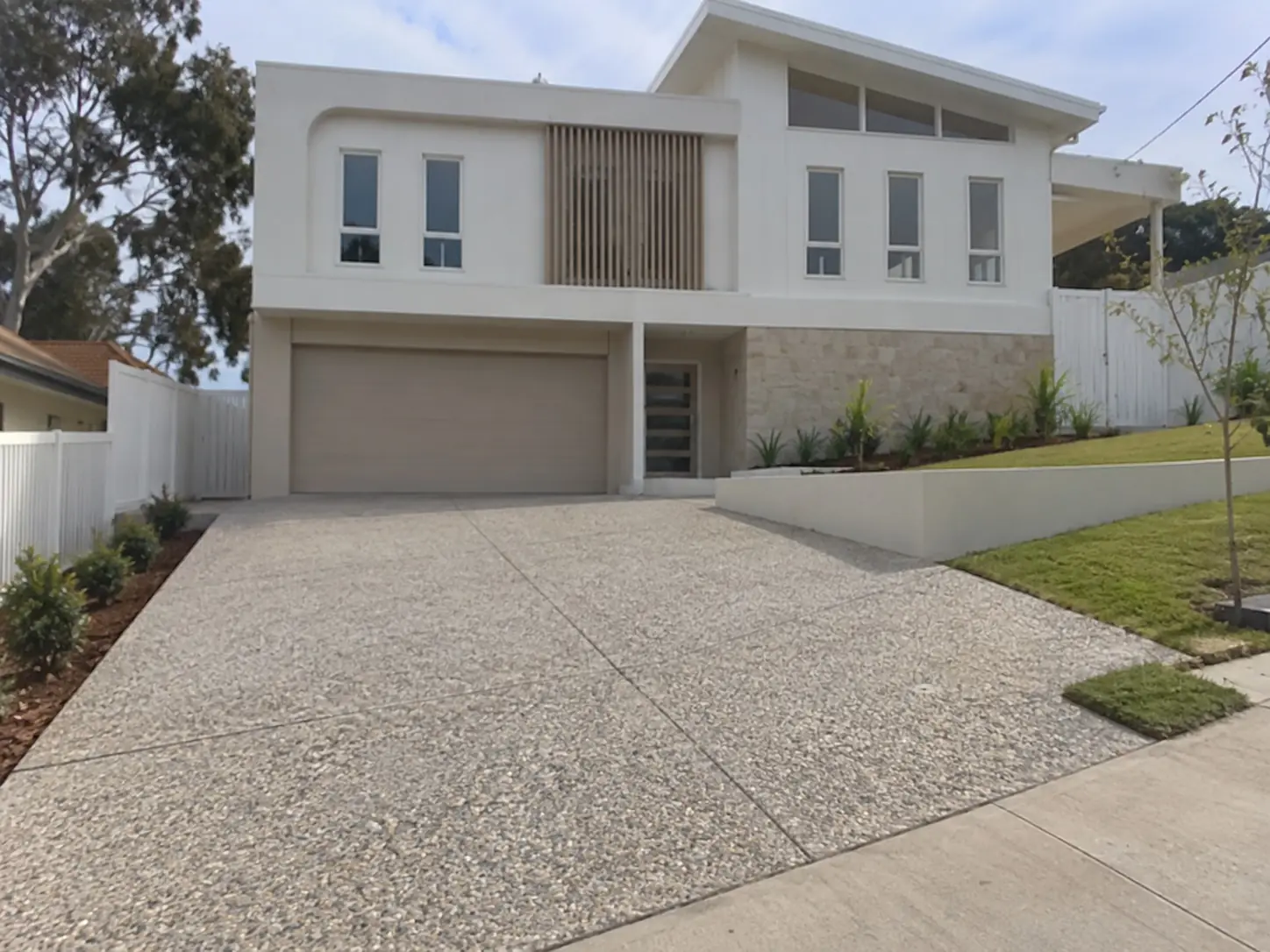 Exposed aggregate driveway showing pebble finish in Wollongong